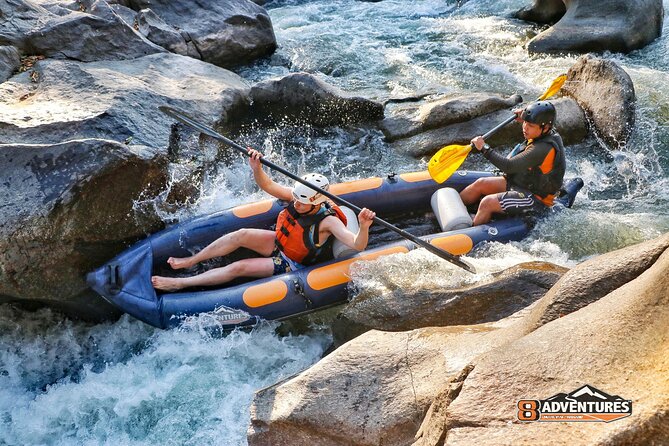 10KM Inflatable Kayaking and 3HR Trekking Adventure - Swimming beneath the 10-meter waterfall