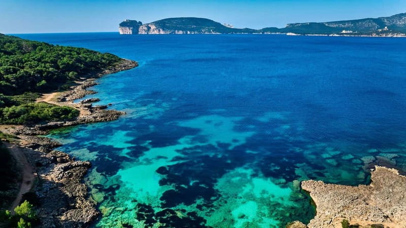Alghero: trekking in the Porto Conte park - The Cala Bramassa view of Porto Conte Bay