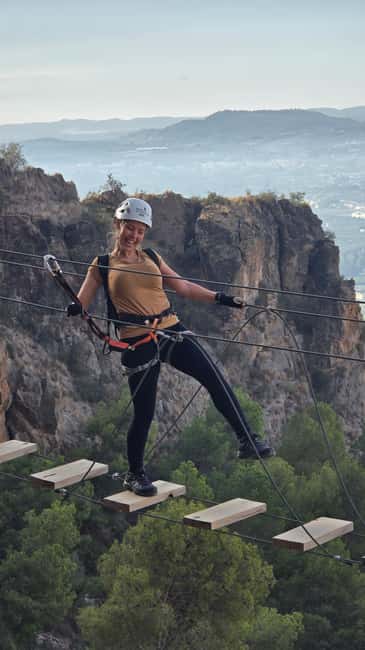 Alicante: Redovan Via Ferrata, family Climb - Crossing the first 25-meter bridge
