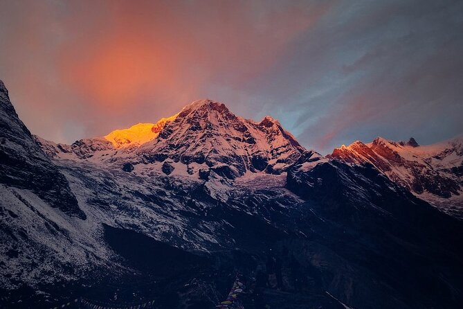 First light on the Annapurna range above the treeline