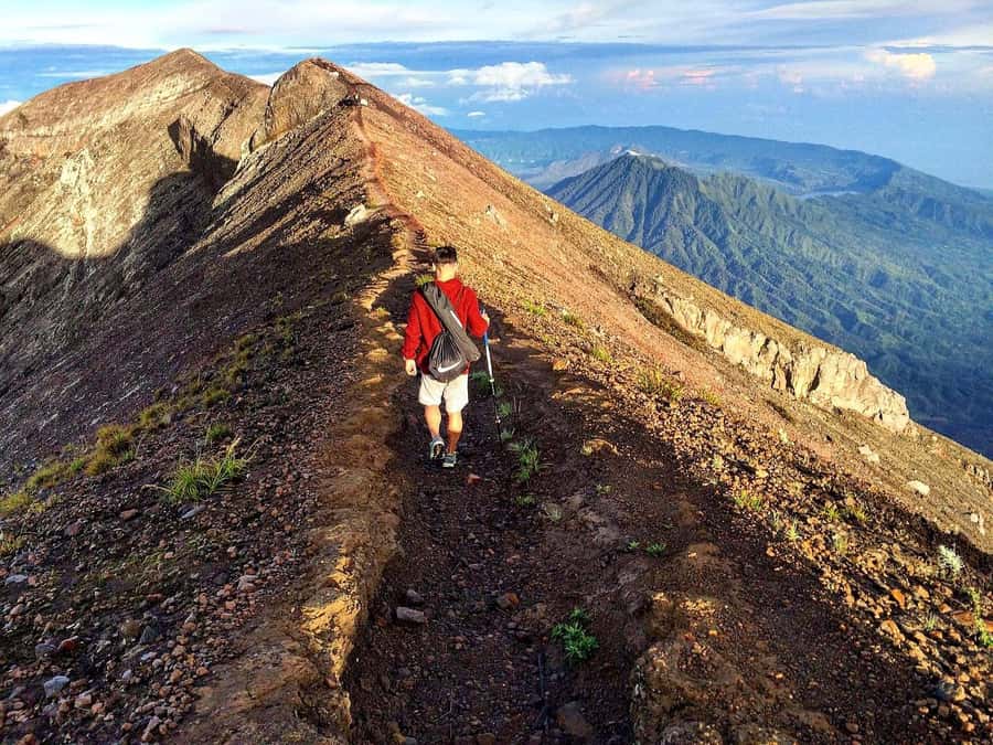 Bali: Mount Agung Sunrise Trekking Tour via Besakih Temple - Jungle, volcanic sand, and steep rock