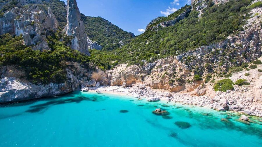 Baunei: Cala Goloritzè Trekking Tour with A Guide - Swimming, lunch, and time at the beach