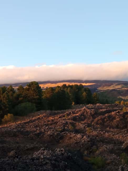 Catania: Mount Etna Sunset Trekking with Wine Tasting - Leaving Catania by rural volcanic tracks