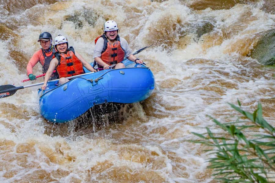 Chiang Mai: Whitewater Rafting and Waterfall Trekking Tour - Hiking through orchards, jungle, and the river bed