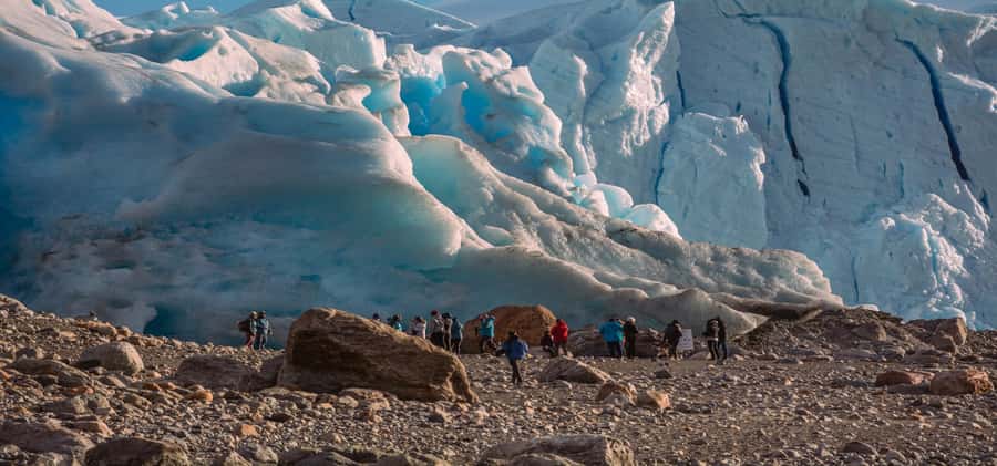 El Calafate: Safari Azul Los Glaciares Trekking Tour - Touching ancient ice at the glacier edge