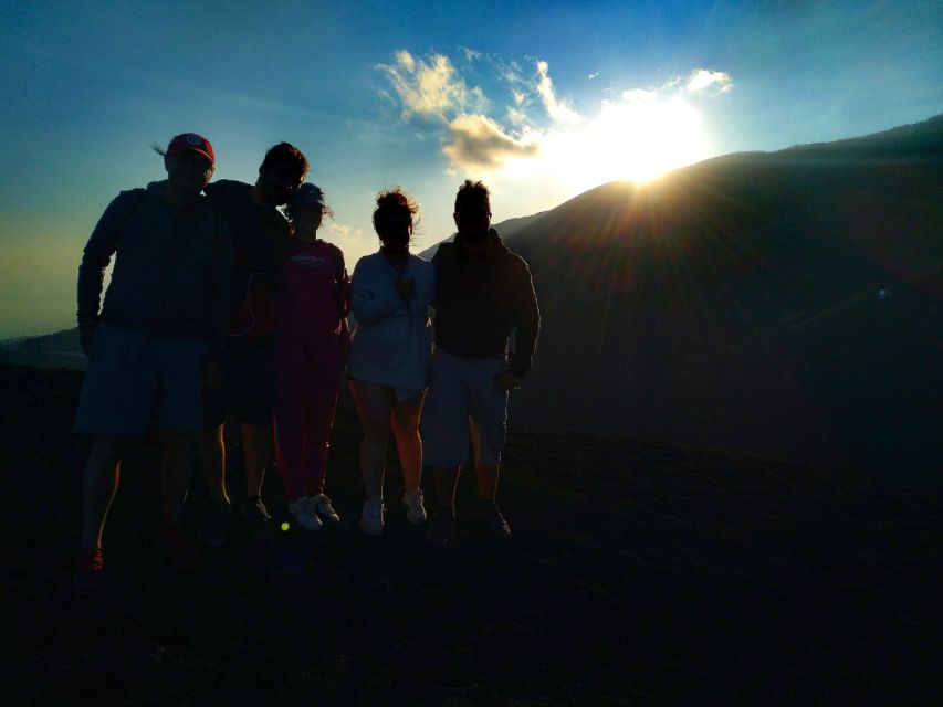 Etna Sunset Tour: Volcano trek, Cave & tasting from Catania - Walking the craters near Rifugio Sapienza