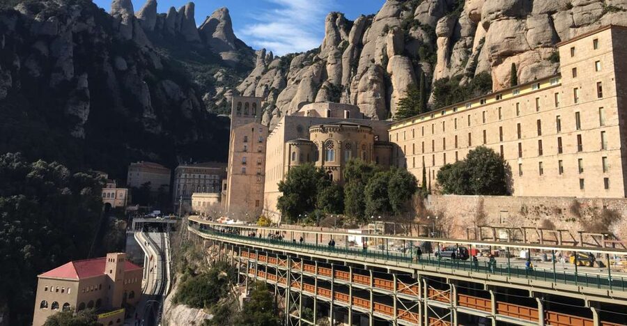 From Barcelona: Montserrat Monastery & Scenic Mountain Hike - Entering the Benedictine sanctuary
