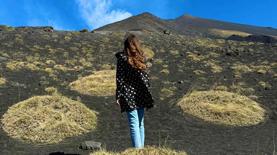 From Catania: trek on Mount Etna, Lava Cave & tasting Tour - Walking the extinct craters at 1,986 meters