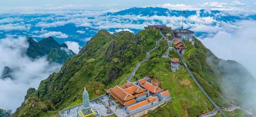 From Sapa: Full-Day Fansipan Peak Trekking Tour - Reaching Fansipan above the clouds