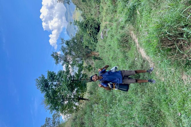 Full Day Trek to Kuang Si Waterfalls, Remote Village - Group size, guides, and the pace of the day
