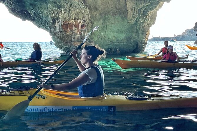 Leuca kayak tour + swimming + speleo-trek in cave - The price and what you receive for $62.63
