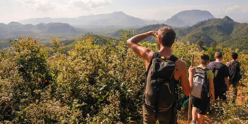 Luang Prabang: Mountain Trek & Local Villages Overnight Tour - A Local Boat to Tad Sae Waterfalls