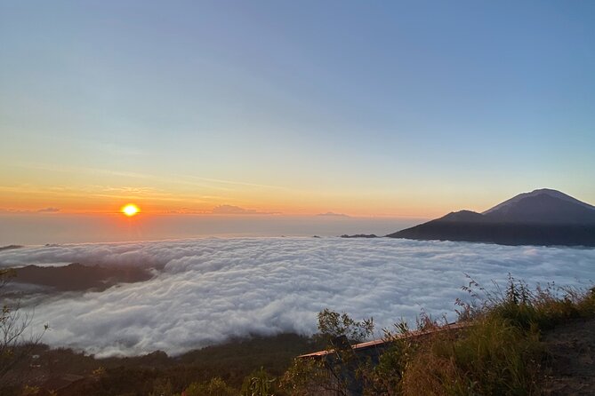 Mount Batur Trekking and Natural Hot Spring - All Inclusive Tour - Sunrise over the caldera and Mount Agung