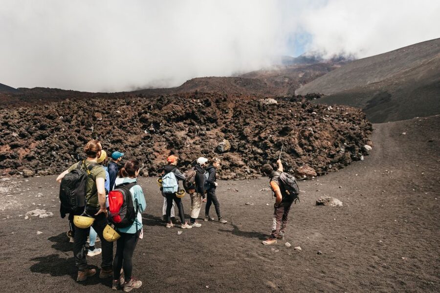 Mount Etna: Guided Trek 3,000 Meters to the Summit - Descending through loose volcanic ground