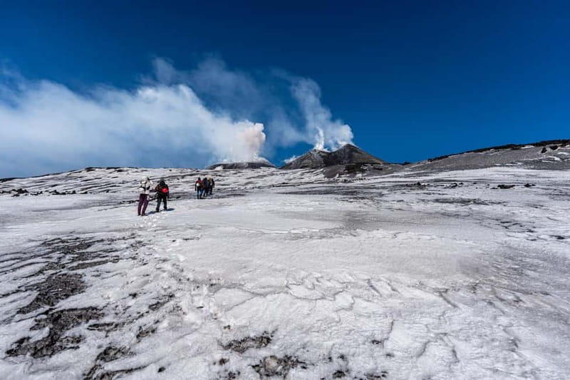 Mount Etna: scenic Summit Trek with a volcano Guide and Gear - The descent past recent eruption craters