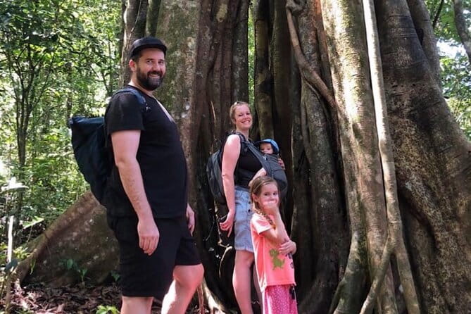 Munduk Twin Lake Jungle Hike, Ulun Danu Temple, & Waterfall - Crossing Tamblingan Lake by traditional canoe