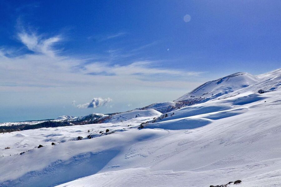 Piano Provenzana: Guided Mt. Etna Snowshoeing Trek - The 2002 eruption zone and damaged resort