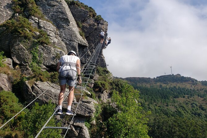 Private Climbing Experience Via ferrata Senda do Santo - Taking on the stepped suspension bridge