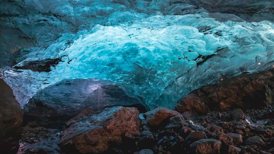 Sólheimajökull: Glacier Hike and Blue Ice Cave Tour - Walking across crevasses and ridges