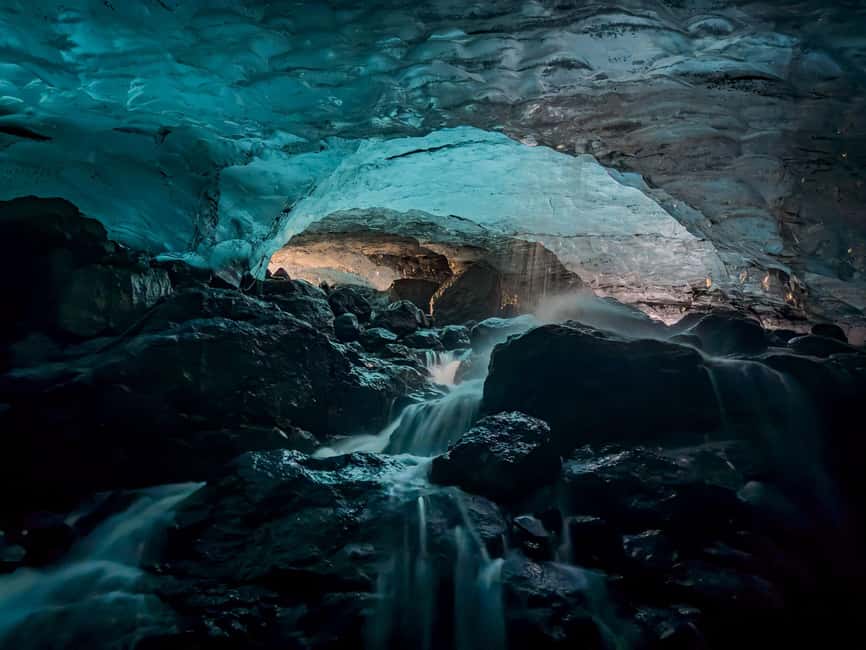 Sólheimajökull: Glacier Hike and Blue Ice Cave Tour - Entering the naturally formed blue ice cave