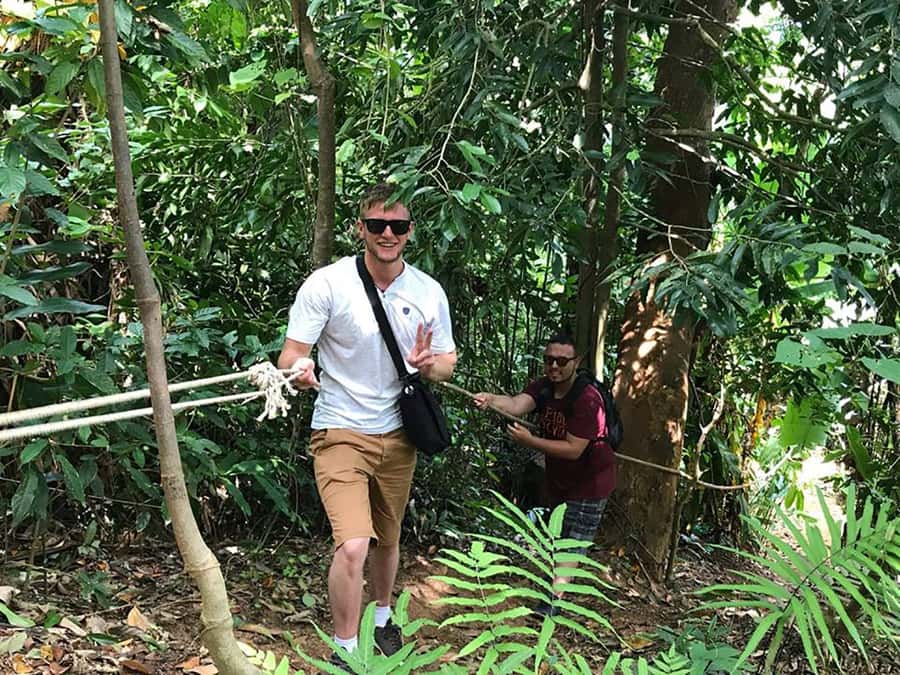 Temple and Jungle Trekking tour with Lunch at Farm-to-Table - Walking uphill through Phuket’s jungle
