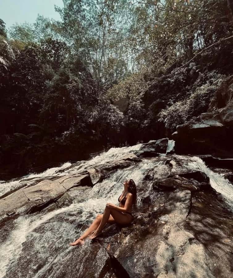 Ubud: Trekking Through Rivers & Forests to Three Waterfalls - Water shoes, swimming, and the natural slide