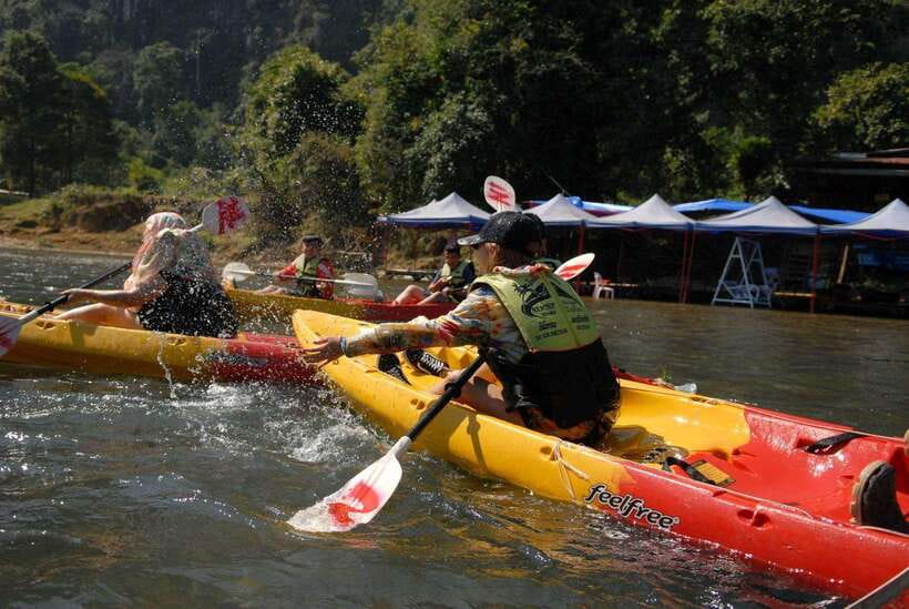 Vang Vieng: Day Tour with Kayaking, Ziplining, and Rafting - Tham Chang Cave by tire and fixed rope