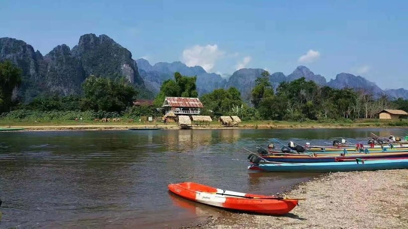 Vang Vieng: Day Tour with Kayaking, Ziplining, and Rafting - Guides, communication, and timing