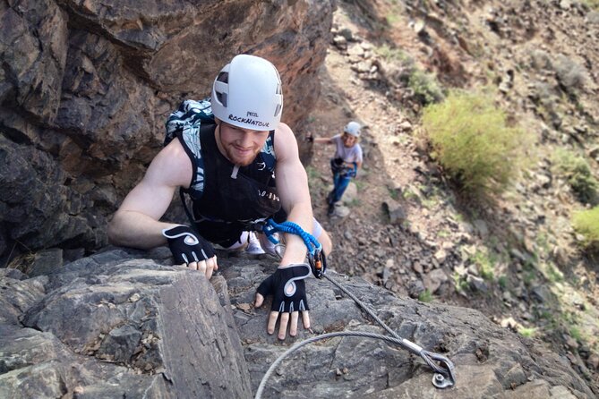 Via Ferrata Gran Canaria: Adventure Route for First Time Climbers - Climbing iron steps above the valley