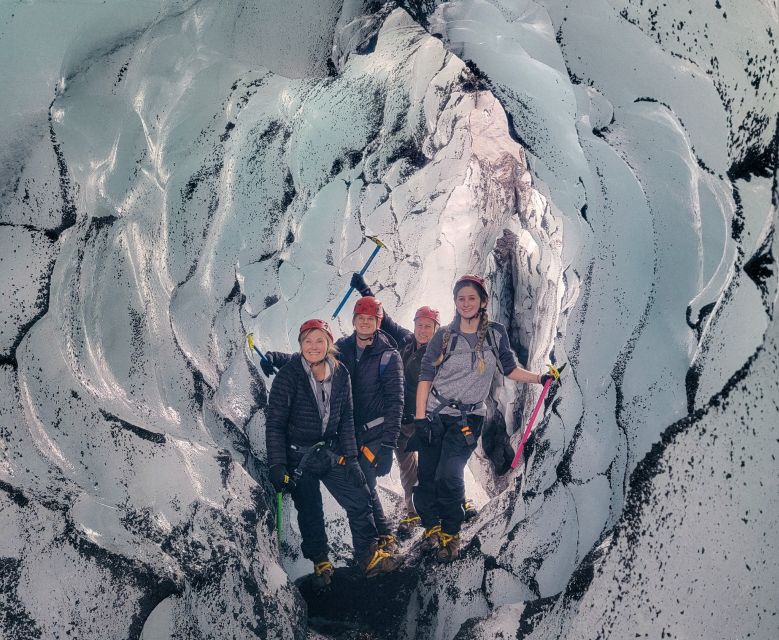 Vik: Guided Glacier Hike on Sólheimajökull - Black ash, blue ice, and glacier formations